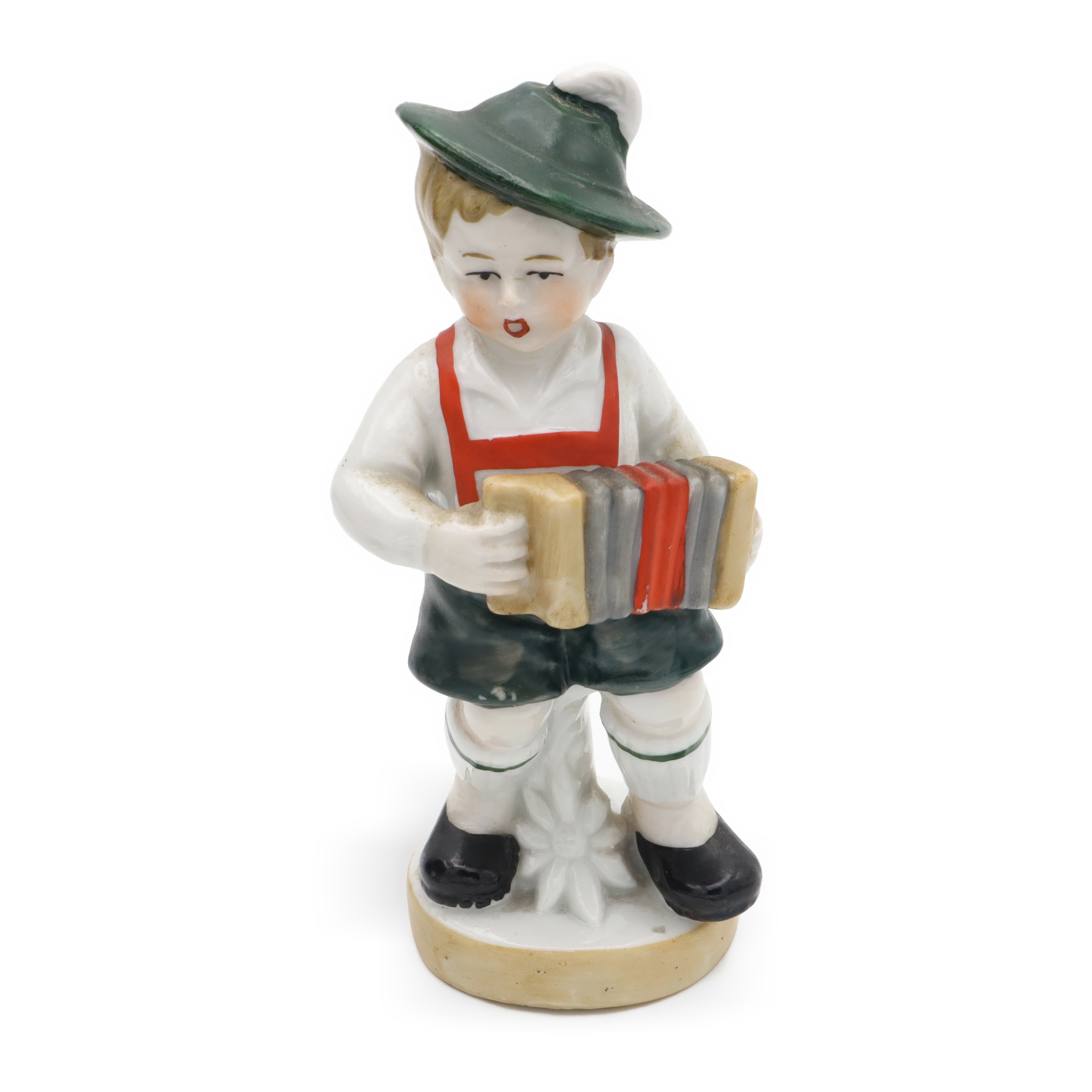 Vintage Porzellanfigur Junge mit Akkordeon, Gesamtansicht, traditionelle Tracht, deutsche Volkskunst Porzellanfigur Junge mit Akkordeon in traditioneller Tracht, Vintage, Gesamtansicht, deutsche Volkskunst